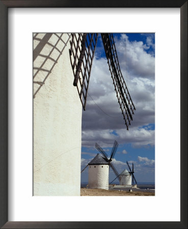 Row Of Traditional Windmills, Campo De Criptana, Spain by Damien Simonis Pricing Limited Edition Print image
