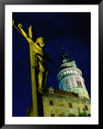 Statue Of Christ On Cross With Round Tower Of Cesky Krumlov Behind, Cesky Krumlov, Czech Republic by Richard Nebesky Pricing Limited Edition Print image