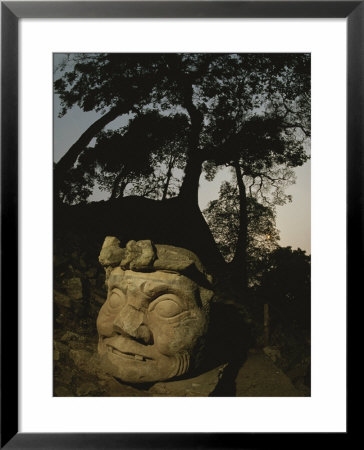 The Honduran Sun Setting Behind The Mayan Diety Known As God N by Kenneth Garrett Pricing Limited Edition Print image