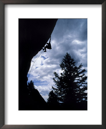 A Rock Climber Ascends A Steep Route At The Wild Iris, Wyoming by Bill Hatcher Pricing Limited Edition Print image