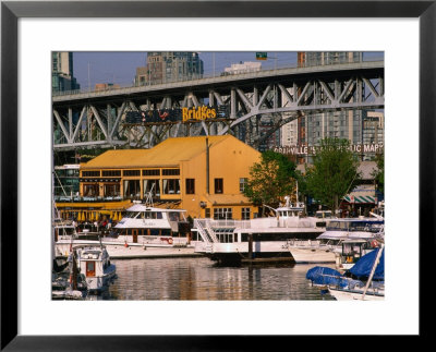 Yachts Docked Near Bridges Restaurant With Granville Island Bridge In Background, Vancouver, Canada by Stephen Saks Pricing Limited Edition Print image