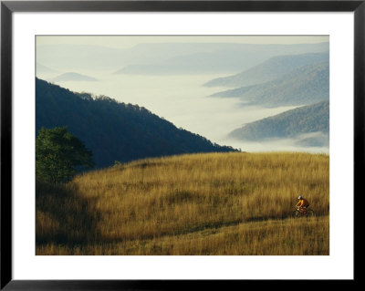 Mountain Biking Through Fields Above Fog-Shrouded Elk River Valley by Skip Brown Pricing Limited Edition Print image