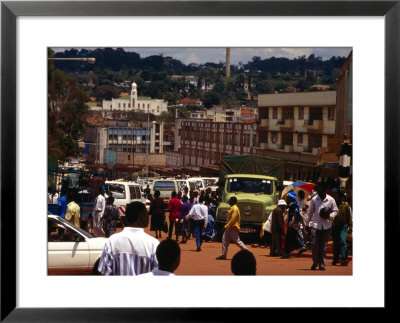 People And Traffic On Busy Street, Kampala, Uganda by Johnson Dennis Pricing Limited Edition Print image