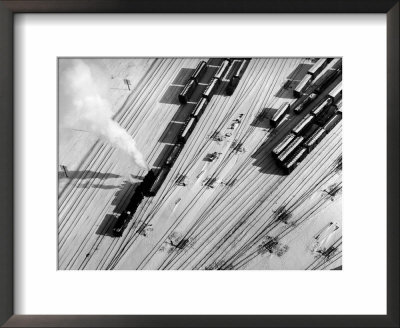 Aerial View Of Trains After Snowfall In The City by Margaret Bourke-White Pricing Limited Edition Print image