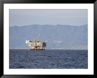 Oil Rig In The Santa Barbara Channel And The Santa Ynez Mountains, California by Rich Reid Pricing Limited Edition Print image