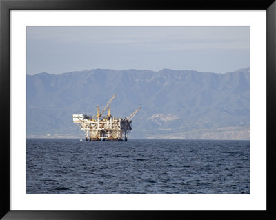 Oil Rig In The Santa Barbara Channel And The Santa Ynez Mountains, California by Rich Reid Pricing Limited Edition Print image