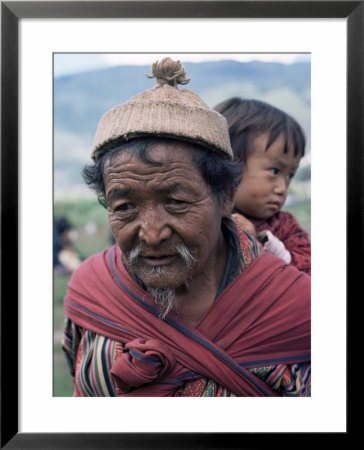 Old Man Carrying Child, Bhutan by Sybil Sassoon Pricing Limited Edition Print image
