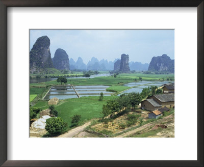 Farmland And Rock Formations Of Guangxi, Guilin Province, China by Anthony Waltham Pricing Limited Edition Print image