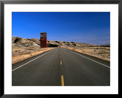 Highway And Abandoned Grain Elevator In Ghost Town Of Dorothy, Alberta, Canada by Barnett Ross Pricing Limited Edition Print image