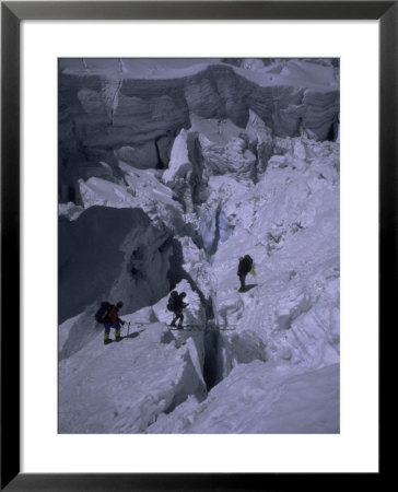 Climbers Crossing Ladder On Everest, Nepal by Michael Brown Pricing Limited Edition Print image