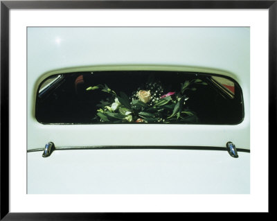 A Car Window In Italy Decorated With Flowers From A Wedding by Ed George Pricing Limited Edition Print image