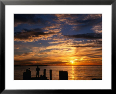 Man Fishing On Jetty At Safety Bay, Rockingham, Australia by Wayne Walton Pricing Limited Edition Print image