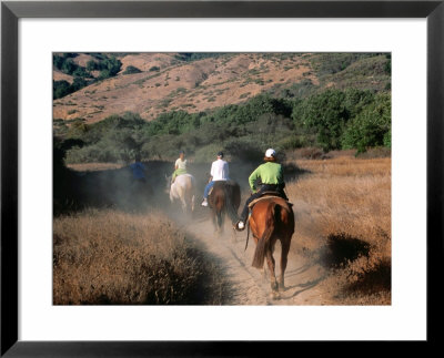 People Horseback Riding Down Dusty Track, Big Sur, California by Eddie Brady Pricing Limited Edition Print image
