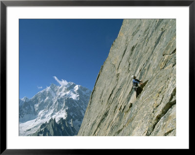 A Man Climbing Near Naysar Pass, Karakoram Mountains, Pakistan by Jimmy Chin Pricing Limited Edition Print image