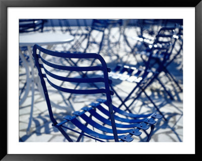 Detail Of Chair Shapes And Shadows In Morning On Pavement Outside Cafes, Loutro, Greece by Trevor Creighton Pricing Limited Edition Print image