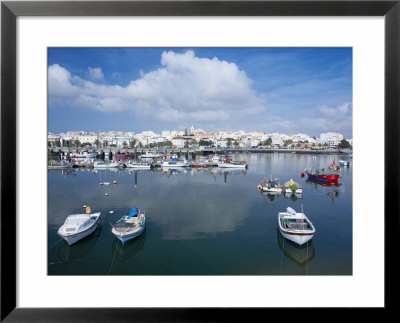 View Lagos Harbour And Town, Lagos, Western Algarve, Algarve, Portugal by Marco Simoni Pricing Limited Edition Print image