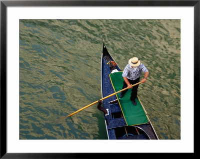 A Gondolier Steers His Craft Through A Canal, Venice, Veneto, Italy by Glenn Beanland Pricing Limited Edition Print image