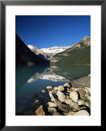 View To Mount Victoria Across The Emerald Waters Of Lake Louise, Alberta, Canada by Ruth Tomlinson Pricing Limited Edition Print image