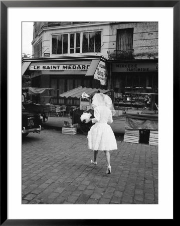 Solitary Bride Crossing A Parisian Street by Alfred Eisenstaedt Pricing Limited Edition Print image