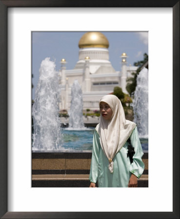 Muslim Woman With Mosque In Background, Omar Ali Saifuddien Mosque, Brunei Darussalam, Brunei by Holger Leue Pricing Limited Edition Print image
