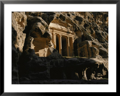 One Of The Many Tombs Carved Into The Sandstone Over 2000 Years Ago by Annie Griffiths Belt Pricing Limited Edition Print image