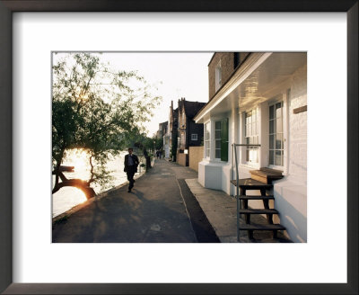 Houses With Raised Doorways As A Flood Precaution, River Thames, Strand On The Green, England by Adam Woolfitt Pricing Limited Edition Print image