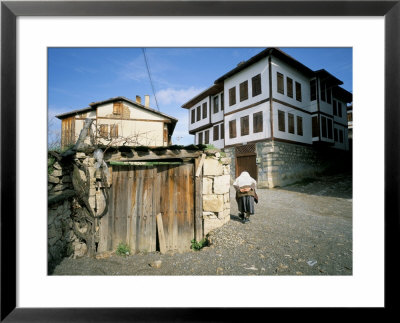 Peasant Woman In The Street, Yoruk Koyu, Near Safranbolu, Anatolia, Turkey by Marco Simoni Pricing Limited Edition Print image