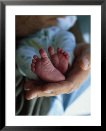 A Father Holding His Baby's Feet by Mitch Diamond Pricing Limited Edition Print image