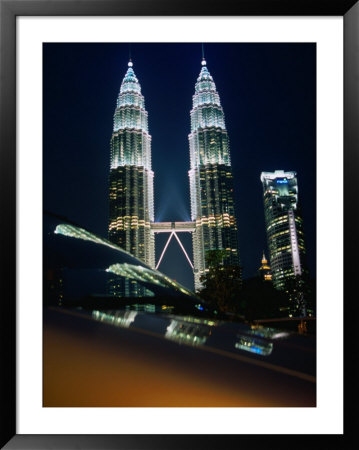 Petronas Towers At Night Reflected Off A Car Hood, Kuala Lumpur, Wilayah Persekutuan, Malaysia by Dominic Bonuccelli Pricing Limited Edition Print image