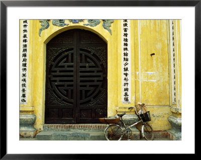 Yellow Nguyen Thai Hoc Temple Entrance And Bicycle, Hanoi, Vietnam by Anthony Plummer Pricing Limited Edition Print image