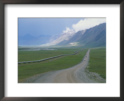 Alaska Pipeline Running Along Dalton Highway Through Atigan Valley by Rich Reid Pricing Limited Edition Print image