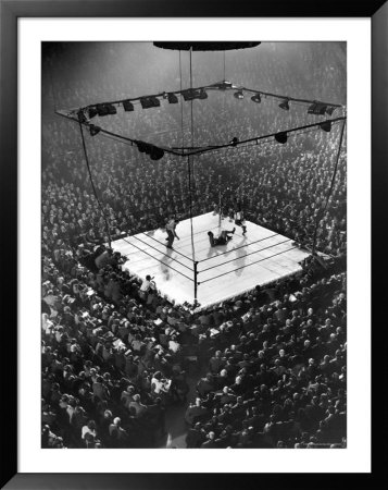 Heavyweight Champion Joe Lewis Lies On The Canvas After Being Knocked Down By Jersey Joe Walcott by Gjon Mili Pricing Limited Edition Print image