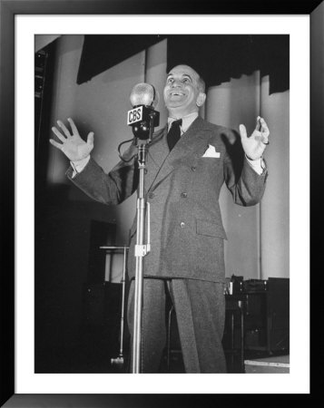 Al Jolson Smiling And Talking Into Microphone During Cbs Radio Broadcast by Wallace Kirkland Pricing Limited Edition Print image