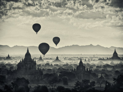 Hot Air Balloons Floating Above The Temples Of Pagan, Myanmar At Sunrise by Scott Stulberg Pricing Limited Edition Print image
