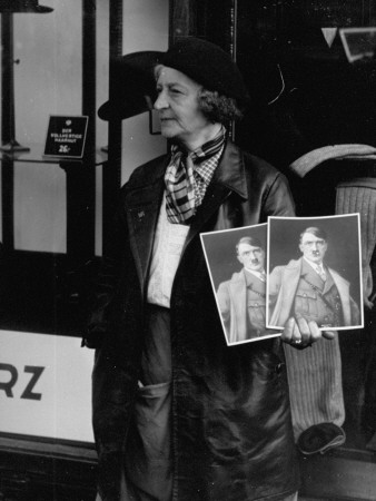 Street Vender Selling Portraits Of Adolf Hitler On The Kaertnerstrassa At Arrival Of Nazi Soldiers by John Phillips Pricing Limited Edition Print image