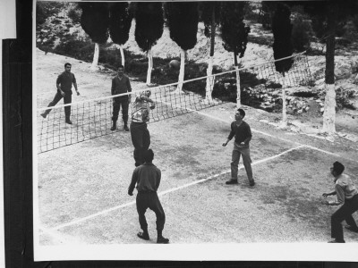 Guards Playing Volleyball During Break From Guarding Nazi War Criminal Eichmann, Djalameh Jail by Gjon Mili Pricing Limited Edition Print image