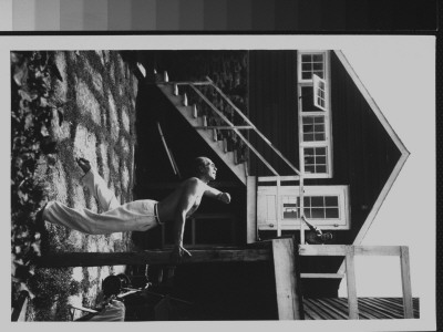 Dancer Jose Limon Dancing Outside His Home As Wife Pauline Lawrence Watches From Upper Deck by Gjon Mili Pricing Limited Edition Print image