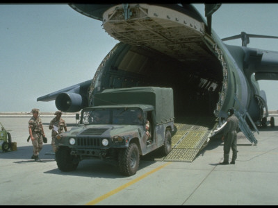 Us Army And Air Force Soldiers Loading Truck For Desert Shield Gulf Crisis Operation by Gil High Pricing Limited Edition Print image