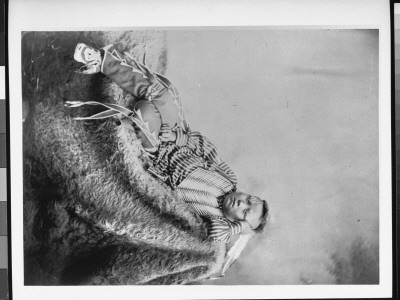 Native American Kiowa Boy, Lone Bear Lying On Animal Skin Rug, Dressed As Osage by Will Soule Pricing Limited Edition Print image