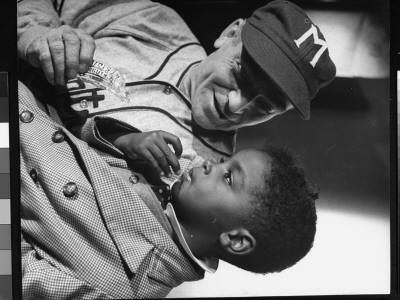 Richard Lane Offering Peanuts To Robinson Jr. On Set For The Jackie Robinson Story by J. R. Eyerman Pricing Limited Edition Print image