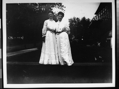 Florence Thiero And Bertha Willis Posing Outdoors In Pretty Dresses by Wallace G. Levison Pricing Limited Edition Print image