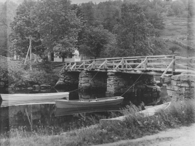 Three Row Boats Tied To A Small Bridge In The Country by Wallace G. Levison Pricing Limited Edition Print image