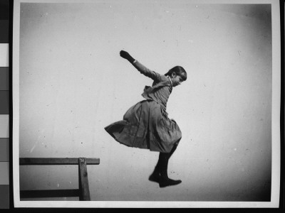 Young Ethel Merritt Jumping In The Air At Coney Island by Wallace G. Levison Pricing Limited Edition Print image