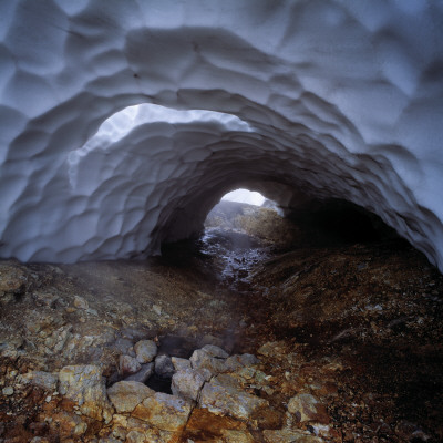 An Ice Cave, Rocky Ground Beneath by Throstur Thordarson Pricing Limited Edition Print image