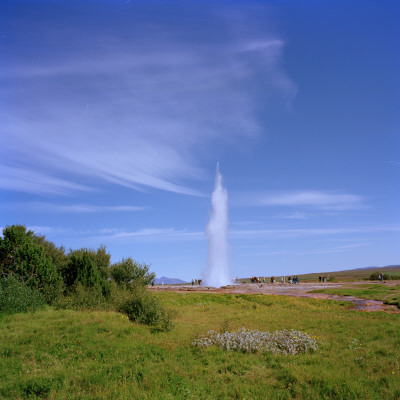 A Geyser In Haukadalur Erupting, Iceland by Oddgeir Karlsson Pricing Limited Edition Print image
