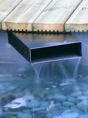 Hampton Court 2004 - Daves Place - Designer Kerrie John: Deck And Metal Water Spout by Clive Nichols Pricing Limited Edition Print image