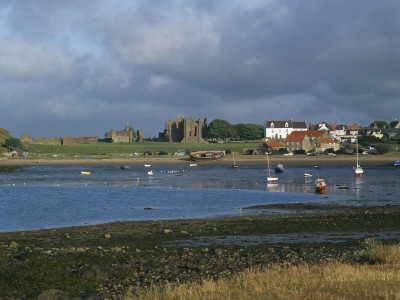 Lindisfarne Priory And Village, Holy Island, Northumberland, England by Colin Dixon Pricing Limited Edition Print image