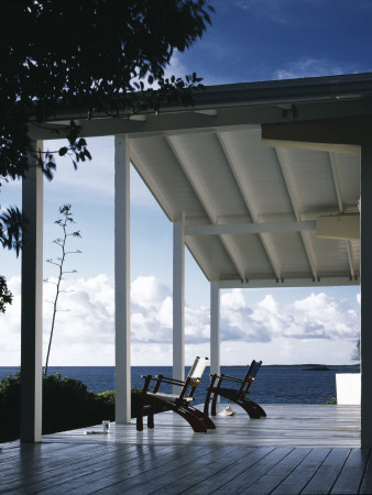 House On Channel Cay, Abacos Island, Bahamas, Verandah And Two Chairs by Nicholas Kane Pricing Limited Edition Print image