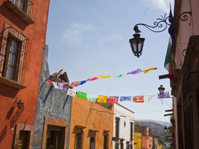 Colorful Paper Flags, San Miguel, Guanajuato State, Mexico by Julie Eggers Pricing Limited Edition Print image