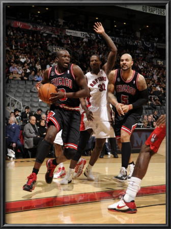 Chicago Bulls V Toronto Raptors: Luol Deng, Ed Davis And Carlos Boozer by Ron Turenne Pricing Limited Edition Print image